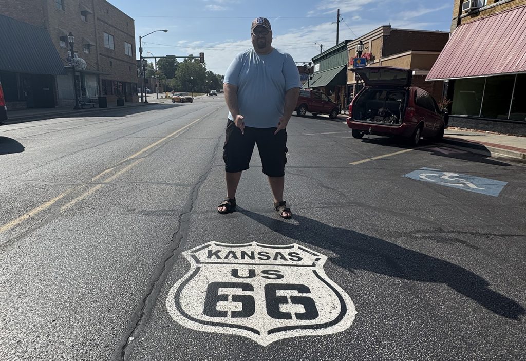 Craig in middle of the road 13 Miles of Route 66 in Kansas