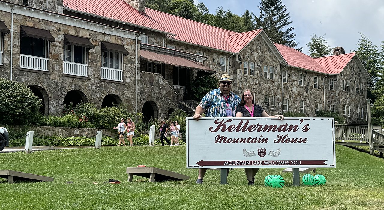 Craig and Wendy behind Kellermans sign Mountain Lake Lodge Virginia